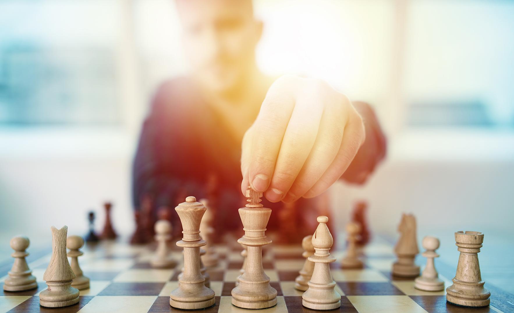 Image of man playing chess